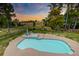 Aerial view of a backyard featuring a sparkling in-ground pool, adjacent to a golf course at 2732 Canebreak Ln, Mount Pleasant, SC 29466