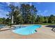 Lush backyard showcasing a sparkling blue swimming pool with an attached hot tub at 2732 Canebreak Ln, Mount Pleasant, SC 29466
