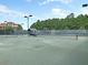 Outdoor tennis court featuring well-maintained surface and surrounding greenery at 2732 Canebreak Ln, Mount Pleasant, SC 29466