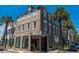 Charming exterior of building showcasing architectural details and corner exposure at 29 1/2 State St # B, Charleston, SC 29401