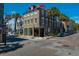 Charming city building featuring beautiful architecture, palm trees, and street views at 29 1/2 State St # B, Charleston, SC 29401