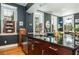 Gourmet kitchen with stainless steel appliances, granite countertops, and abundant natural light at 29 1/2 State St # B, Charleston, SC 29401