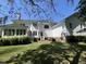 Back exterior of home with a spacious yard and abundant natural light at 3017 Ashburton Way, Mount Pleasant, SC 29466