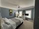 Comfortable bedroom with blue walls, a ceiling fan, and a bright white ceiling at 3017 Ashburton Way, Mount Pleasant, SC 29466