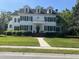 Beautiful two story home with dormer windows, black shutters and a well manicured front lawn at 3017 Ashburton Way, Mount Pleasant, SC 29466