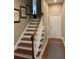 Entryway with staircase, hardwood floors, and a decorative rug at 3017 Ashburton Way, Mount Pleasant, SC 29466