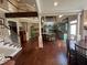 Spacious kitchen with green cabinets, island seating, stainless appliances and two story ceilings at 3017 Ashburton Way, Mount Pleasant, SC 29466