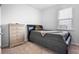 Comfortable bedroom with a soft bed, carpet, and natural lighting at 303 Feldspar Ln, Ladson, SC 29456