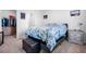 Comfortable bedroom with a soft bed, carpet, and a walk-in closet at 303 Feldspar Ln, Ladson, SC 29456