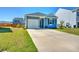 Charming single-Gathering home with a well-manicured lawn and inviting curb appeal at 303 Feldspar Ln, Ladson, SC 29456