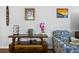 Stylish living room console table, chair, and decor at 303 Feldspar Ln, Ladson, SC 29456