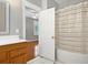 Bright bathroom featuring a shower/tub combo, vanity, and access to bedroom at 304 Pimpernel St, Summerville, SC 29483