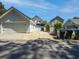 Detached garage with extra parking on an oversized driveway, and plenty of room for storage at 304 Pimpernel St, Summerville, SC 29483