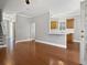 Spacious living room flows into the kitchen with breakfast bar and hardwood floors at 304 Pimpernel St, Summerville, SC 29483
