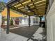Covered patio with an attached pergola and ceiling fans, great for outdoor entertaining at 304 Pimpernel St, Summerville, SC 29483