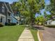 Charming neighborhood street features sidewalks and mature trees at 304 Pimpernel St, Summerville, SC 29483