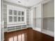 Walk-in closet with custom built-in shelves, hardwood floors and a window for natural light at 304 Pimpernel St, Summerville, SC 29483