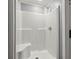 Bright bathroom featuring a clean, all-white shower with built-in seat and modern fixtures at 3113 Matipan Ave, North Charleston, SC 29405