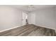 Bedroom with ceiling fan, closet, hardwood flooring and natural light, ideal for a relaxing retreat at 3113 Matipan Ave, North Charleston, SC 29405