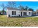 Charming single-story home with a well-manicured lawn and a classic white exterior at 3113 Matipan Ave, North Charleston, SC 29405