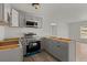 New kitchen with gray cabinets and stainless steel appliances at 3113 Matipan Ave, North Charleston, SC 29405