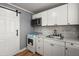 Kitchen features white cabinets and new appliances at 3113 Matipan Ave, North Charleston, SC 29405