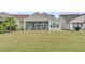 Spacious backyard with a screened-in porch perfect for outdoor entertaining and relaxation at 315 Fish Creek Ct, Summerville, SC 29486