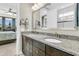 Elegant bathroom with a double vanity, granite countertop, and modern fixtures at 315 Fish Creek Ct, Summerville, SC 29486