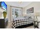 Bedroom with a bed, side table, and a flat-screen TV for a cozy and relaxing atmosphere at 315 Fish Creek Ct, Summerville, SC 29486