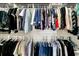 Well-organized closet offering abundant storage with multiple shelves and hanging racks at 315 Fish Creek Ct, Summerville, SC 29486