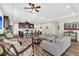 Open concept living space featuring hardwood floors, kitchen, living, and dining area at 315 Fish Creek Ct, Summerville, SC 29486