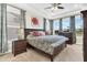 Spacious main bedroom with large windows, tray ceiling, and stylish decor at 315 Fish Creek Ct, Summerville, SC 29486