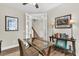 Bright office space with a glass desk and French doors at 315 Fish Creek Ct, Summerville, SC 29486