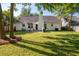 This home has a spacious backyard with a patio, furniture, and plenty of room to relax at 3222 Morningdale Dr, Mount Pleasant, SC 29466