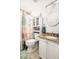 A bright bathroom featuring a shower/tub combo, granite countertops, and a sink vanity at 3222 Morningdale Dr, Mount Pleasant, SC 29466