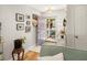 Light-filled foyer with a charming lavender door and stylish decor at 3222 Morningdale Dr, Mount Pleasant, SC 29466