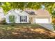 Charming single-story home featuring a well-maintained lawn and a cozy, inviting entrance at 3222 Morningdale Dr, Mount Pleasant, SC 29466