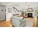 Inviting living room with vaulted ceilings, cozy seating, and a charming fireplace at 3222 Morningdale Dr, Mount Pleasant, SC 29466