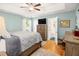 A comfortable main bedroom features a ceiling fan, ample closet space, and natural light at 3222 Morningdale Dr, Mount Pleasant, SC 29466