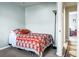 Cozy bedroom with ample natural light, a comfortable bed, and convenient hallway access at 328 Bradley Bend Dr, Moncks Corner, SC 29461
