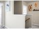 Bright hallway with neutral walls, white trim, and decorative wall art, leading to bedrooms at 328 Bradley Bend Dr, Moncks Corner, SC 29461