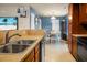Bright kitchen with a breakfast bar offering seating and connection to the adjacent dining area at 328 Bradley Bend Dr, Moncks Corner, SC 29461