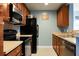 Efficient kitchen offers ample counter space, modern appliances and wood cabinetry at 328 Bradley Bend Dr, Moncks Corner, SC 29461