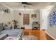 Open-concept living room with hardwood floors and lots of natural light at 328 Bradley Bend Dr, Moncks Corner, SC 29461