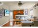 Living room with hardwood floors, comfortable seating, and view into kitchen at 328 Bradley Bend Dr, Moncks Corner, SC 29461