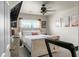 Bright main bedroom featuring a large window, a ceiling fan, and a comfortable bed at 328 Bradley Bend Dr, Moncks Corner, SC 29461