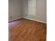 Bedroom with laminate floors and large window at 3342 Habitat Blvd Blvd, Johns Island, SC 29455