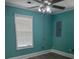Bedroom with blue walls, light grey floors, and ceiling fan at 3342 Habitat Blvd Blvd, Johns Island, SC 29455