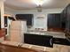 Kitchen with black cabinets and light countertops at 3342 Habitat Blvd Blvd, Johns Island, SC 29455