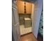 Laundry room featuring a white washer, upper cabinets, and neutral-toned tile flooring, offering convenient laundry at 3342 Habitat Blvd Blvd, Johns Island, SC 29455